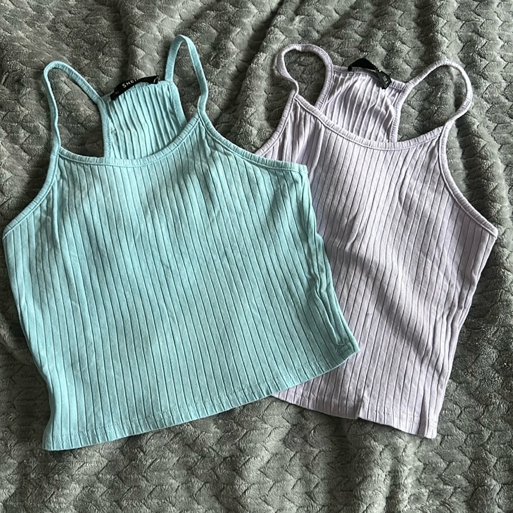 Two racer back lilac and baby blue crop tops